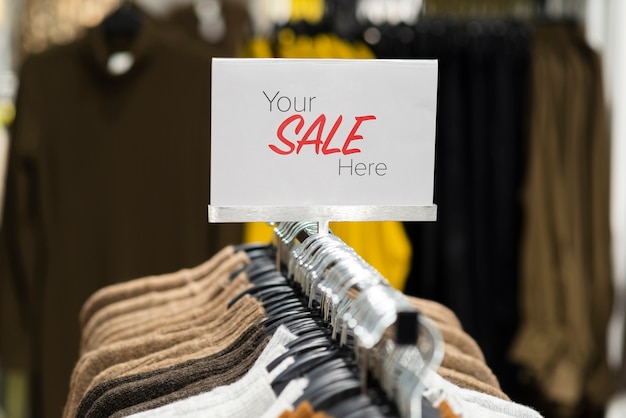 Close-up bar with hangers for clothes Free Psd