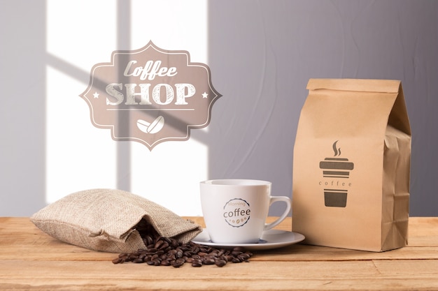 Download Coffee bag with cup beside | Free PSD File