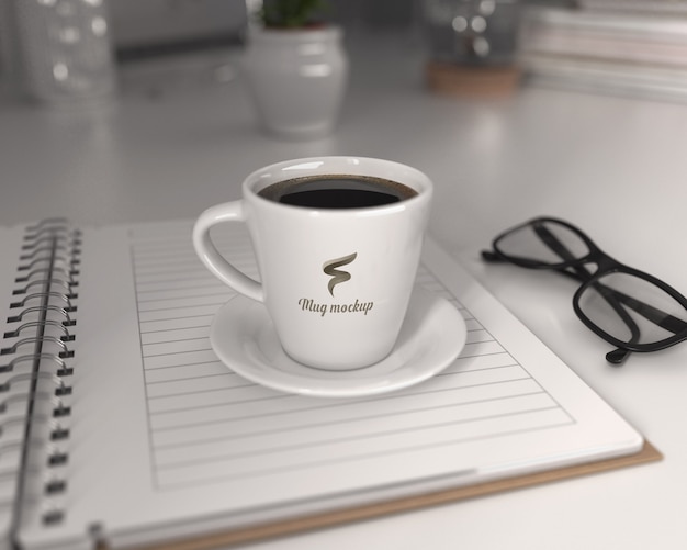 Download Coffee cup mockup with block note | Premium PSD File