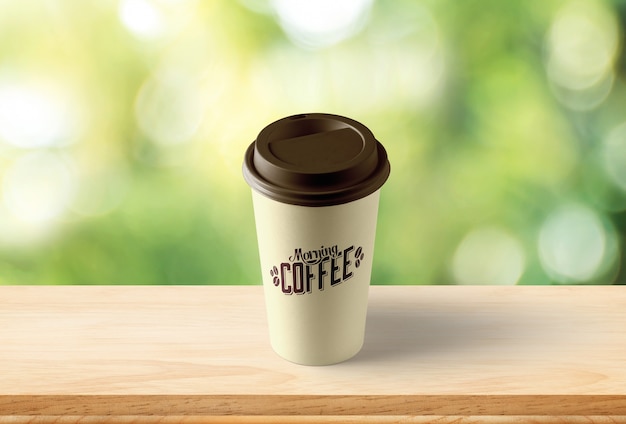Download Premium PSD | Coffee cup mockup with bokeh background
