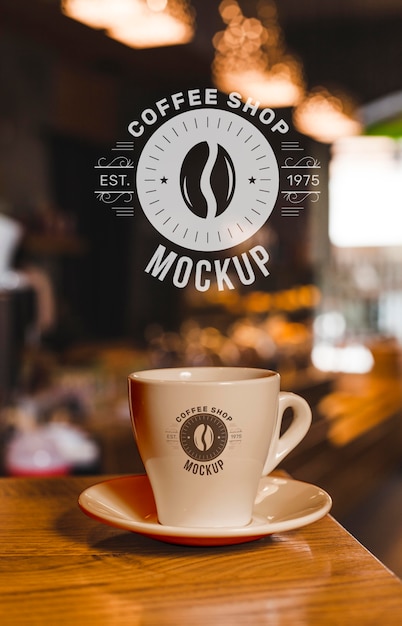 Free PSD | Coffee shop mock-up with cup