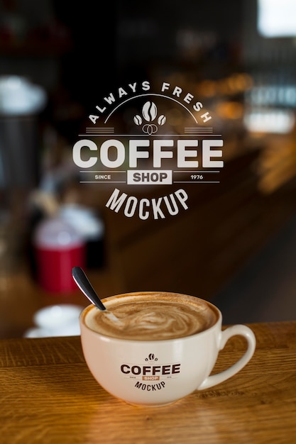 Free PSD | Coffee at shop mock-up