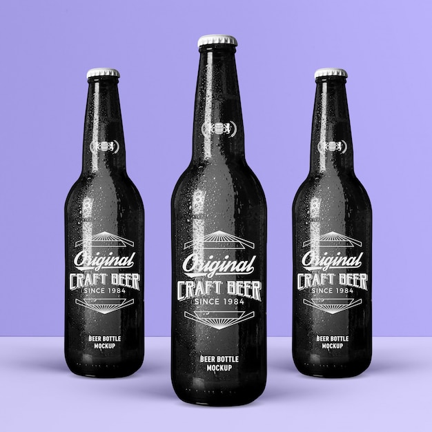 Download Cold crafted studio black glass beer bottles mockup PSD ...