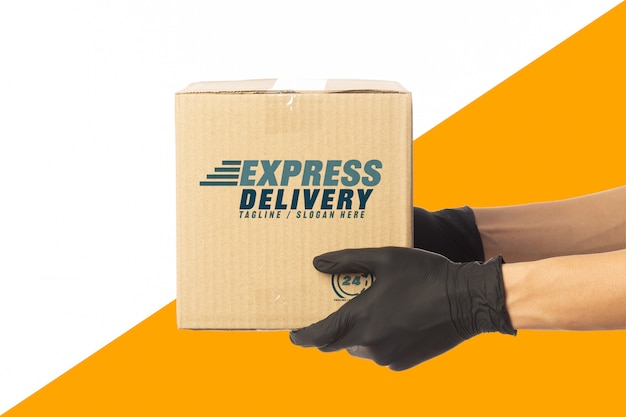 Download Premium PSD | Delivery man hand holding cardboard boxes mockup template for your design ...