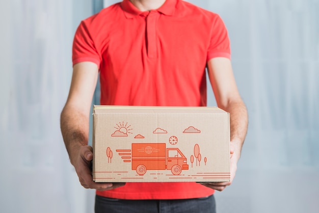 Download Delivery mockup with man holding box PSD file | Free Download