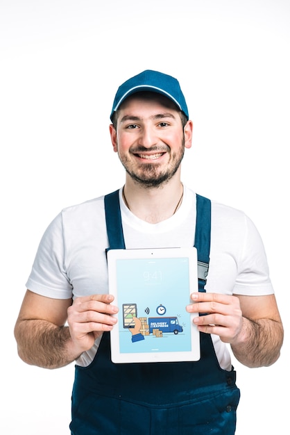 Delivery mockup with man showing tablet | Free PSD File