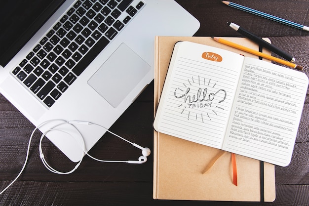 Diary mockup with laptop | Free PSD File