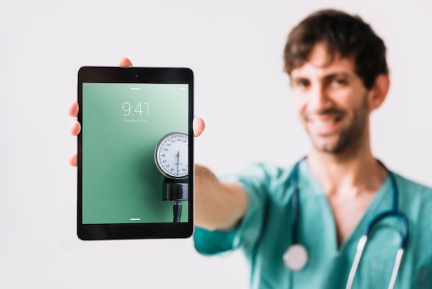 Download Doctor showing tablet mockup PSD Template - Text Effect ...