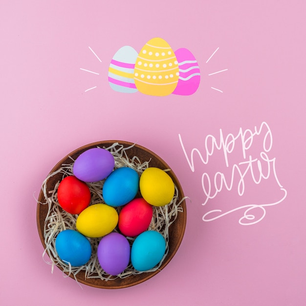 Download Easter day mockup with nest of colored eggs | Free PSD File