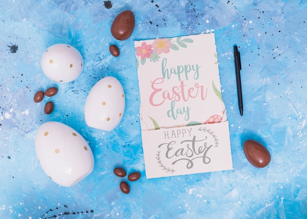 Download Easter mockup with card and chocolate eggs | Free PSD File
