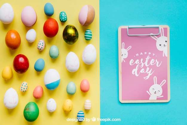 Download Easter mockup with clipboard and eggs | Free PSD File