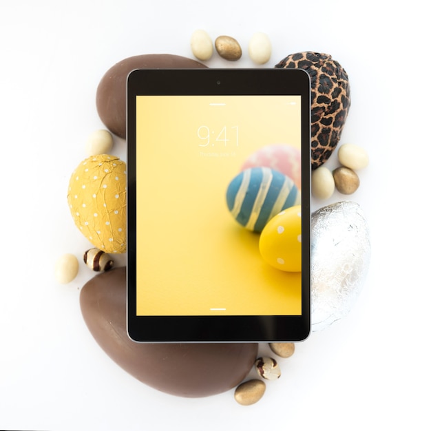 Download Easter mockup with tablet | Free PSD File