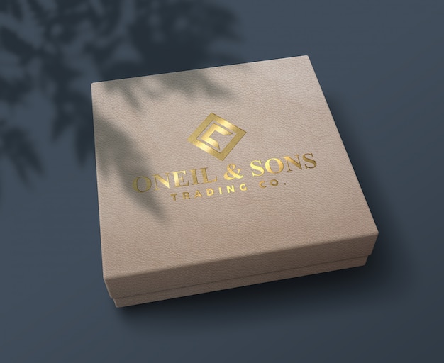 Premium PSD | Elegant and luxury embossed gold foil logo mockup on a box