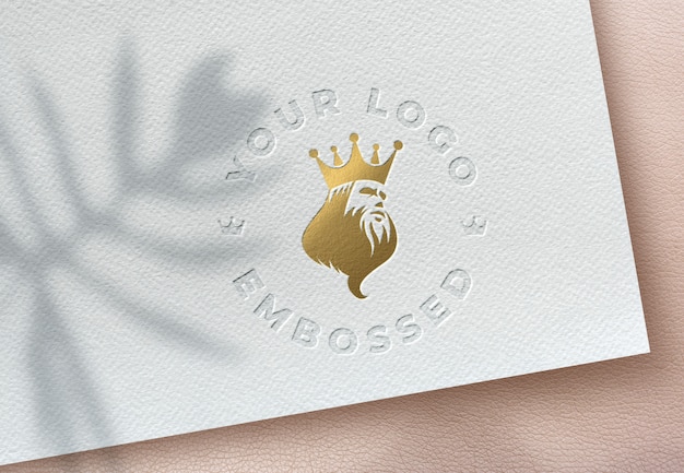 Download Premium PSD | Elegant and luxury embossed and gold foil logo mockup on a white paper