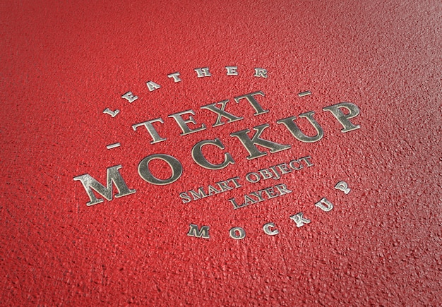 Download Premium PSD | Embossed silver text effect on red leather mockup