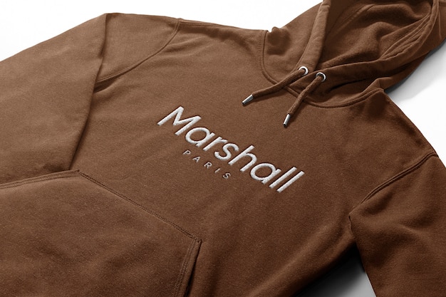 Embroidered logo mockup in hoodie | Premium PSD File