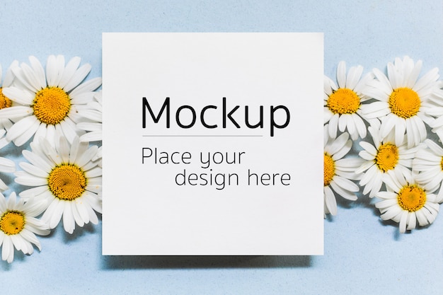 Download Premium PSD | Empty note card mockup with chamomile flowers