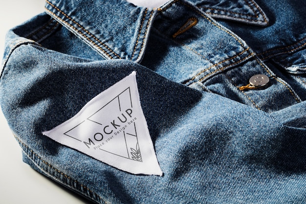 Free PSD | Fabric clothing patch mock-up on denim material