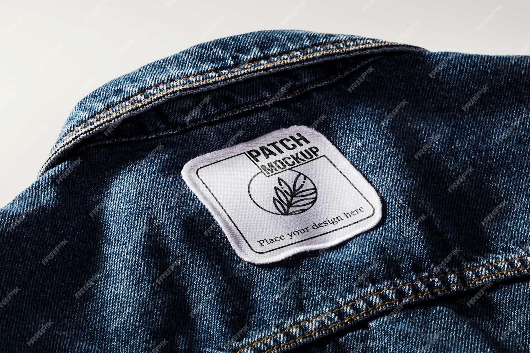 Free PSD | Fabric clothing patch mock-up on denim