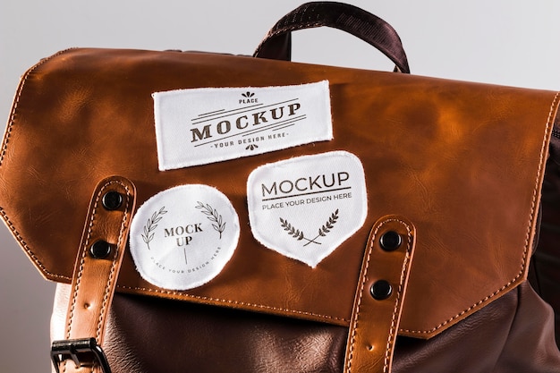 Free PSD | Fabric clothing patch mock-up on leather bag