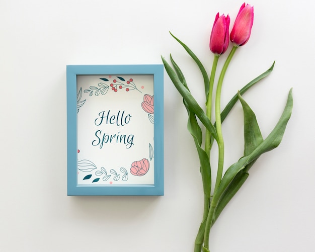 Download Flat lay frame mockup with spring flowers | Free PSD File