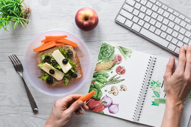 Flat lay of healthy food with notepad mockup Free Psd