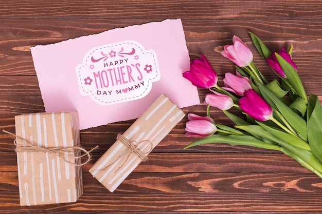 Flat lay mothers day composition with card mockup Free Psd