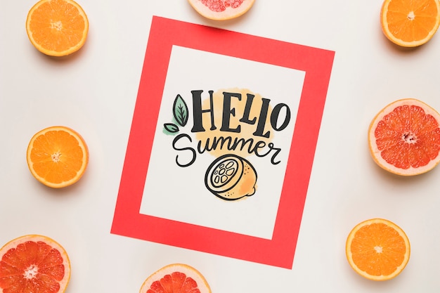Flat lay paper card mockup with summer fruits Free Psd
