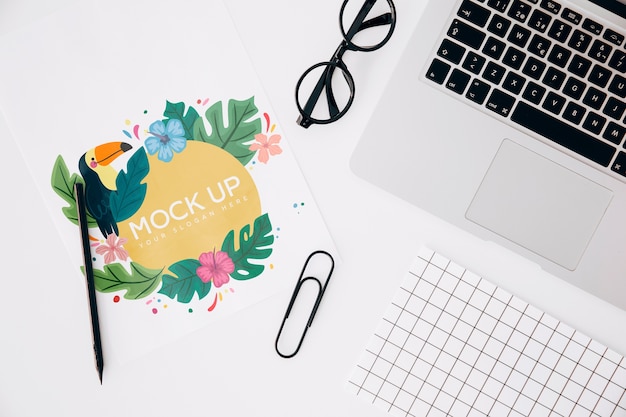 Flat lay paper card mockup on workspace Free Psd