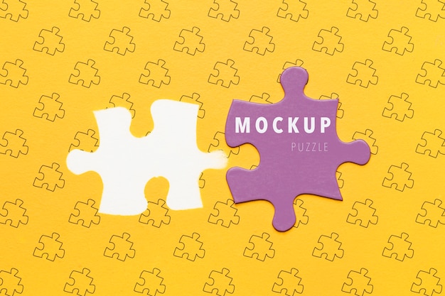 Download Flat lay purple piece of puzzle mock-up | Free PSD File