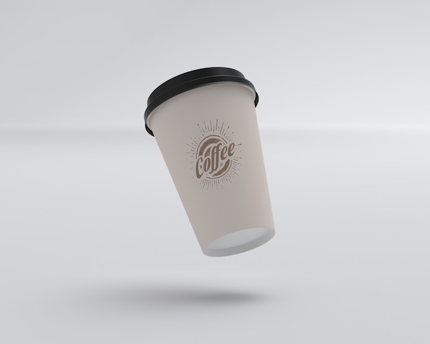 Download Premium PSD | Floating coffee cup mockup