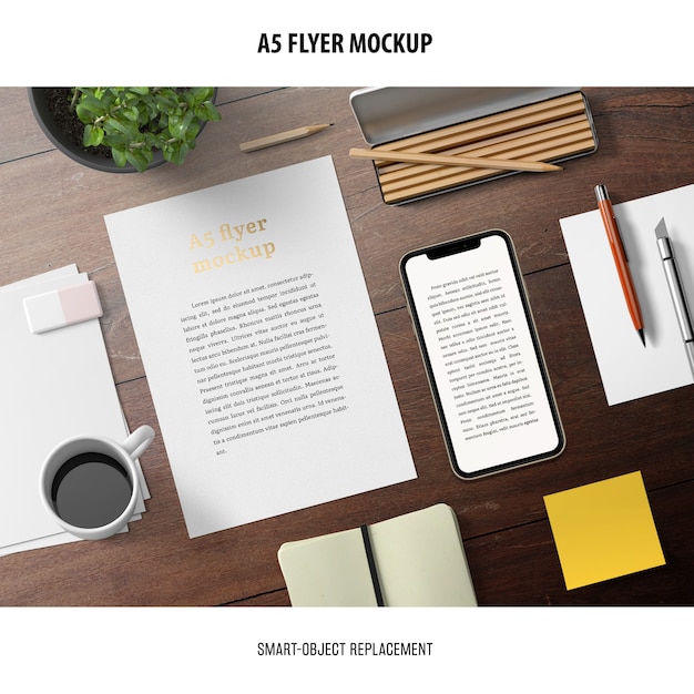 Download Flyer mockup in a desktop | Free PSD File