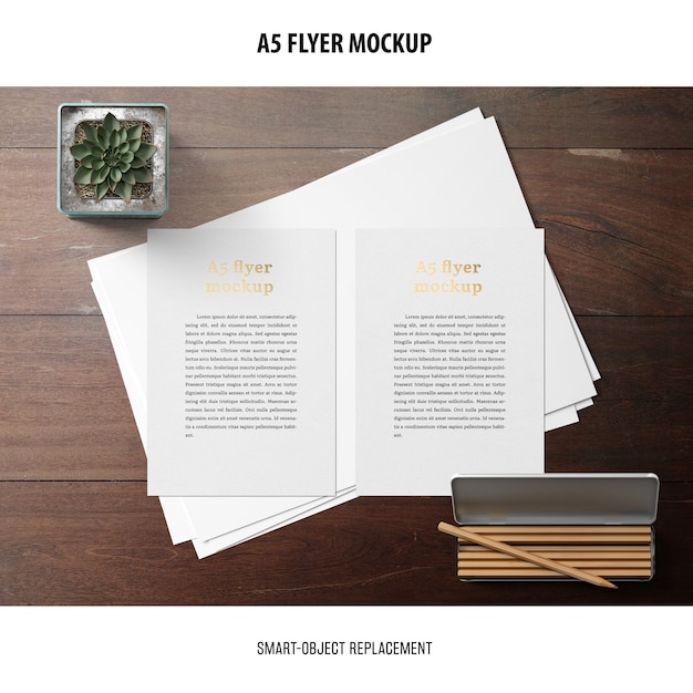 Download Flyer mockup in a desktop | Free PSD File PSD Mockup Templates