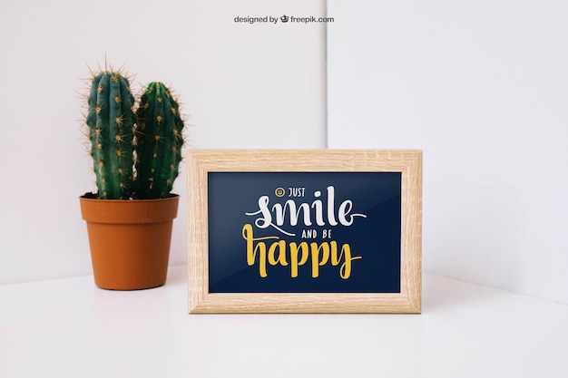 Download Frame mockup with cactus PSD Template