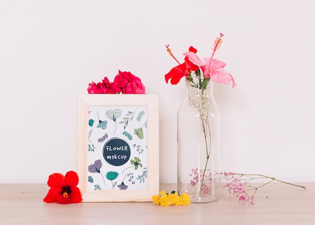 Download Free PSD | Frame mockup with floral decoration