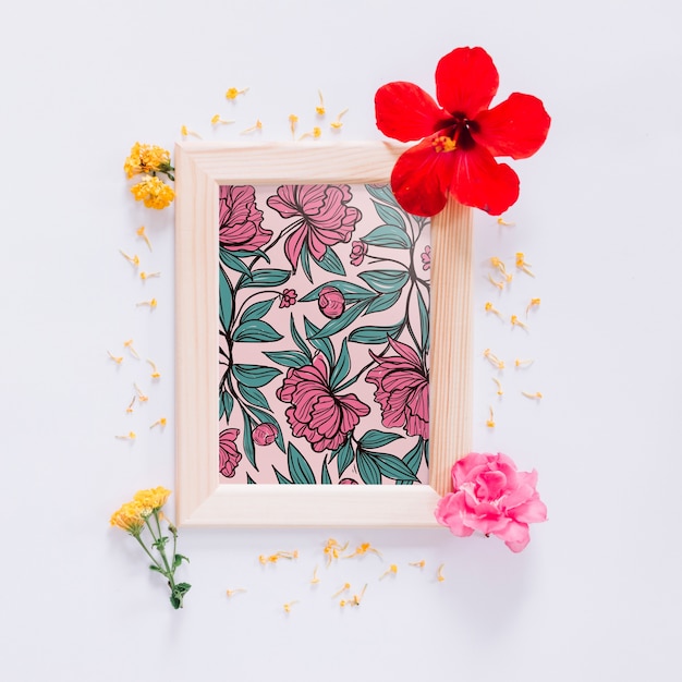 Download Frame mockup with floral decoration | Free PSD File