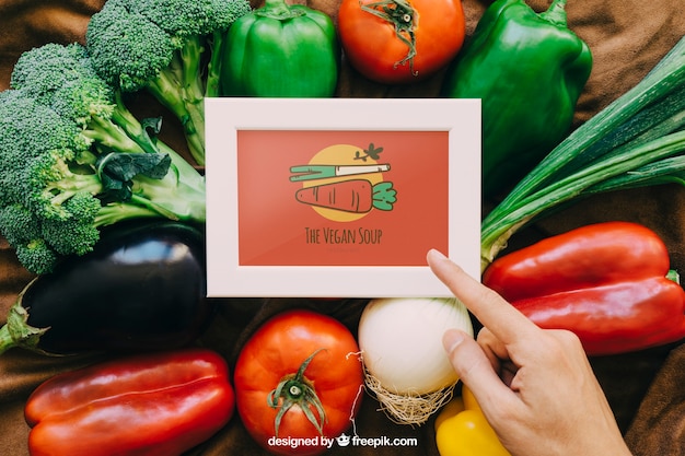 Download Frame mockup with vegetable designs | Free PSD File