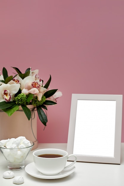 Download Front view blank mockup of photo frame on the pink table ...