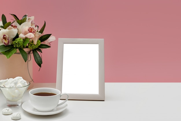 Download Front view blank mockup of photo frame on the pink table ...