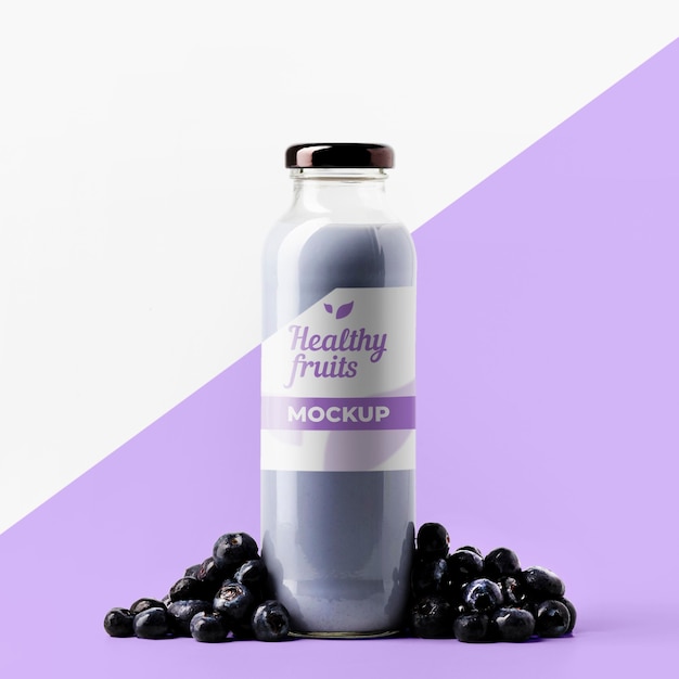 Download Premium Psd Front View Of Clear Juice Bottle With Blueberries