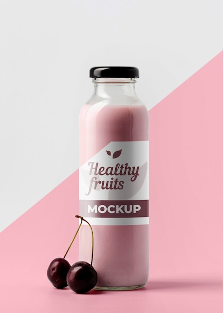 Download Free Psd Front View Of Clear Juice Bottle With Cherries