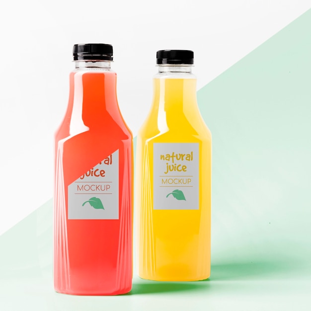 Premium PSD | Front view of clear juice bottles mock-up