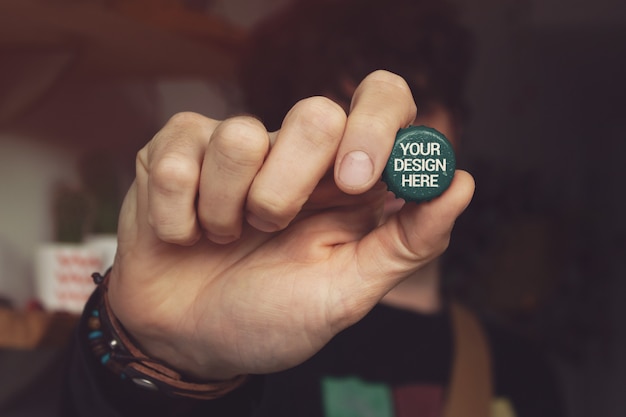 Download Front view hand beer cap mockup | Premium PSD File