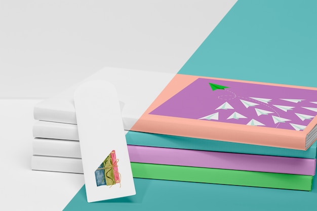 Download Free Psd Front View Stack Of Books Mock Up With Bookmark
