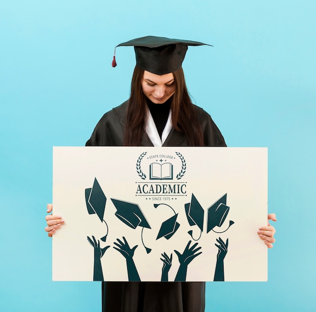 Download Free PSD | Front view student holding mock-up sign