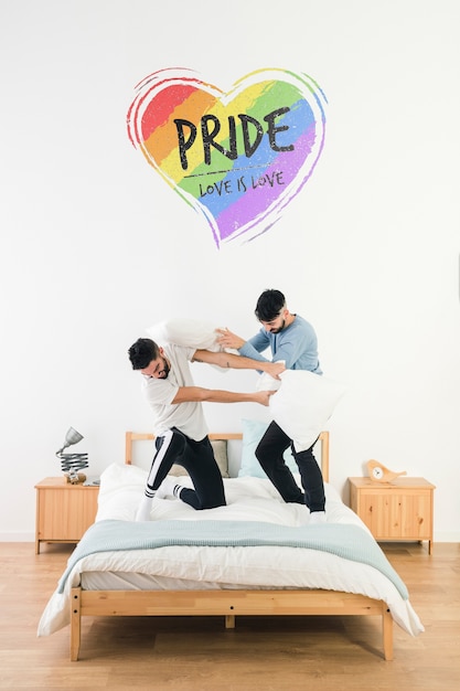 Download Gay couple on bed and copyspace mockup PSD file | Free Download