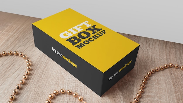 Download Gift box mockup on wood table | Premium PSD File