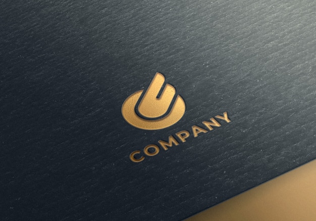 Download Gold logo mockup on black textured paper | Premium PSD File