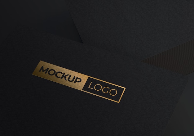 Download Premium PSD | Gold logo mockup on black textured paper