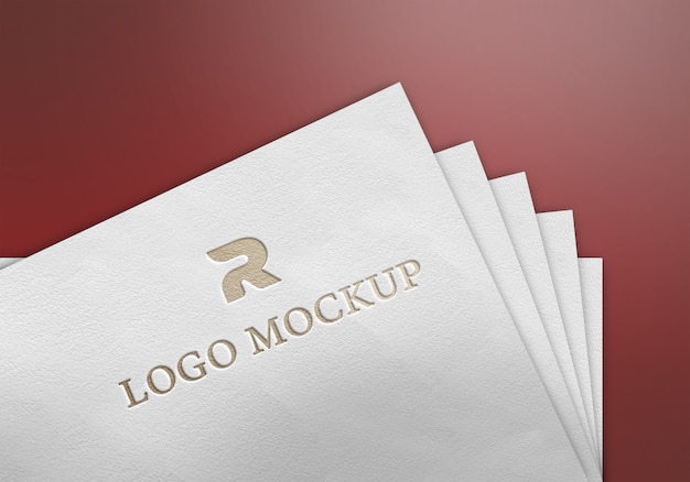 Download Gold logo mockup on paper | Premium PSD File